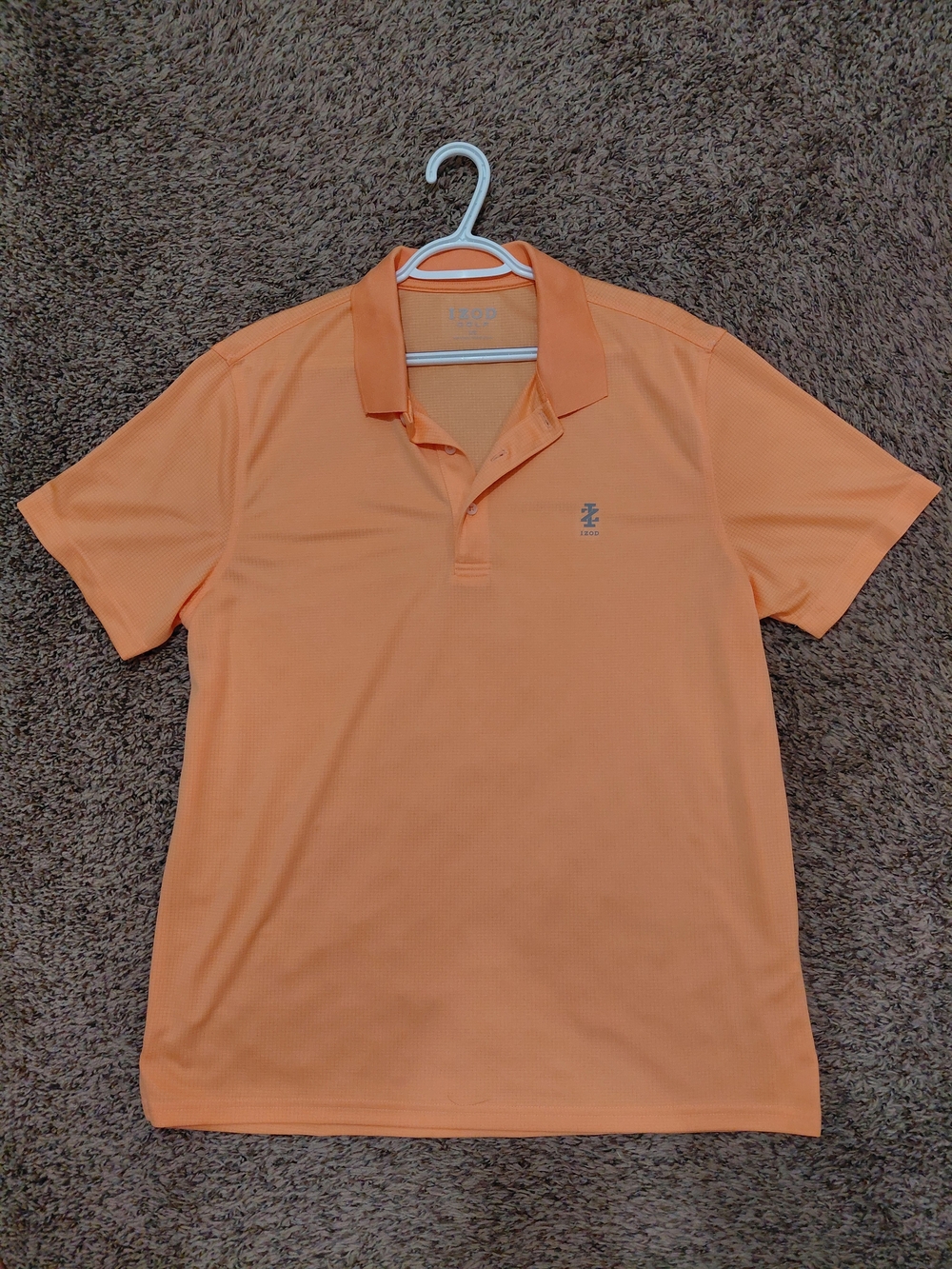 Izod Men's Light Peach Polo Shirt with Subtle Logo